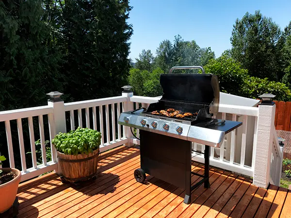barbeque on wooden deck