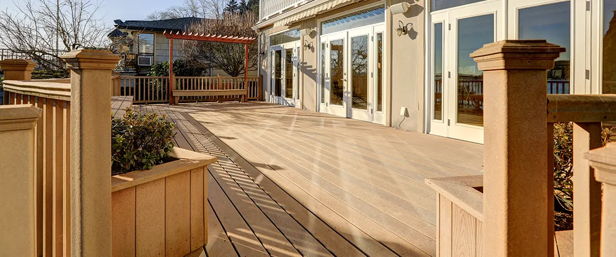 Wooden deck in front of the house overlooking the garden